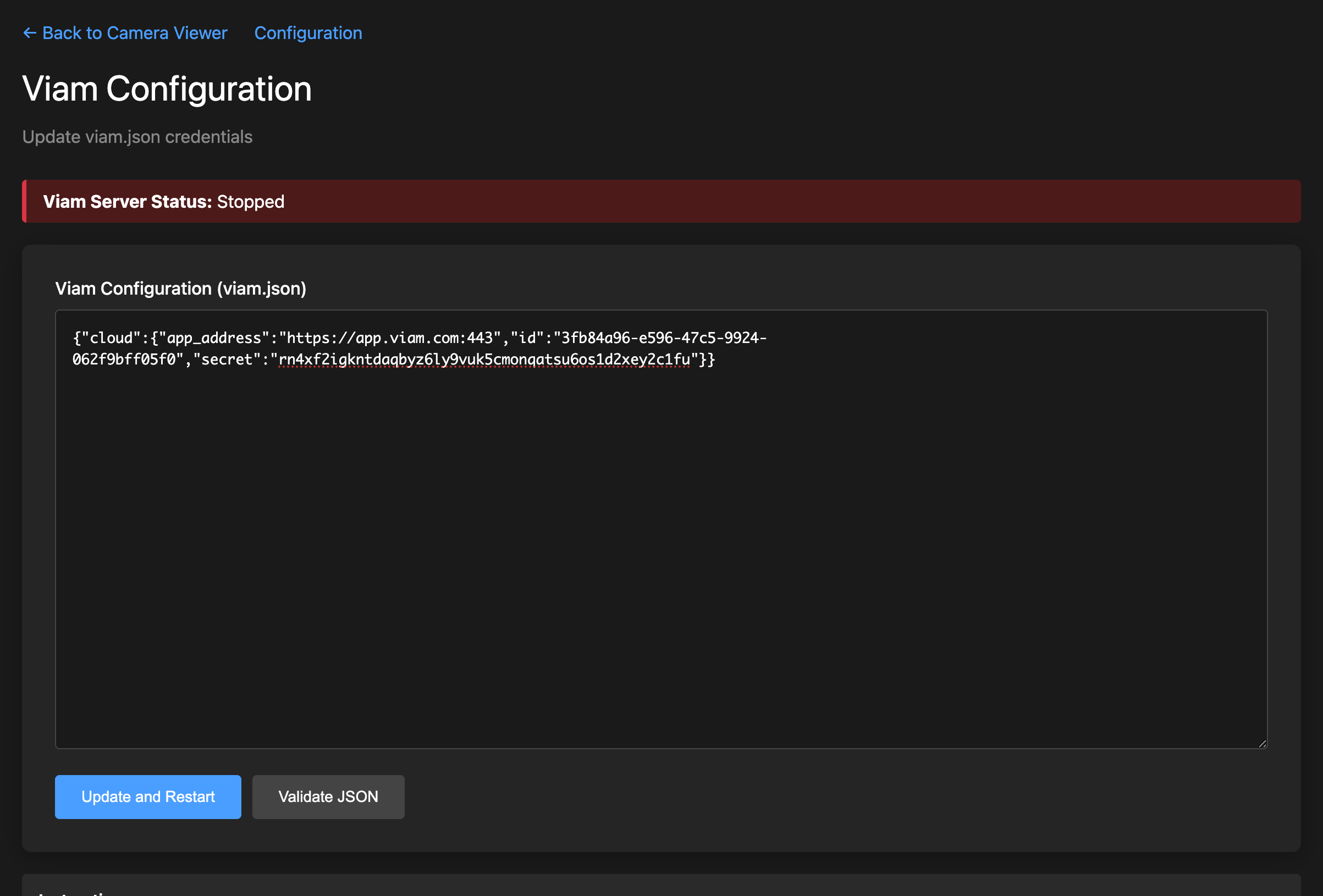 Simulation configuration page with machine cloud credentials pasted into the text area. Viam Server Status shows Stopped.